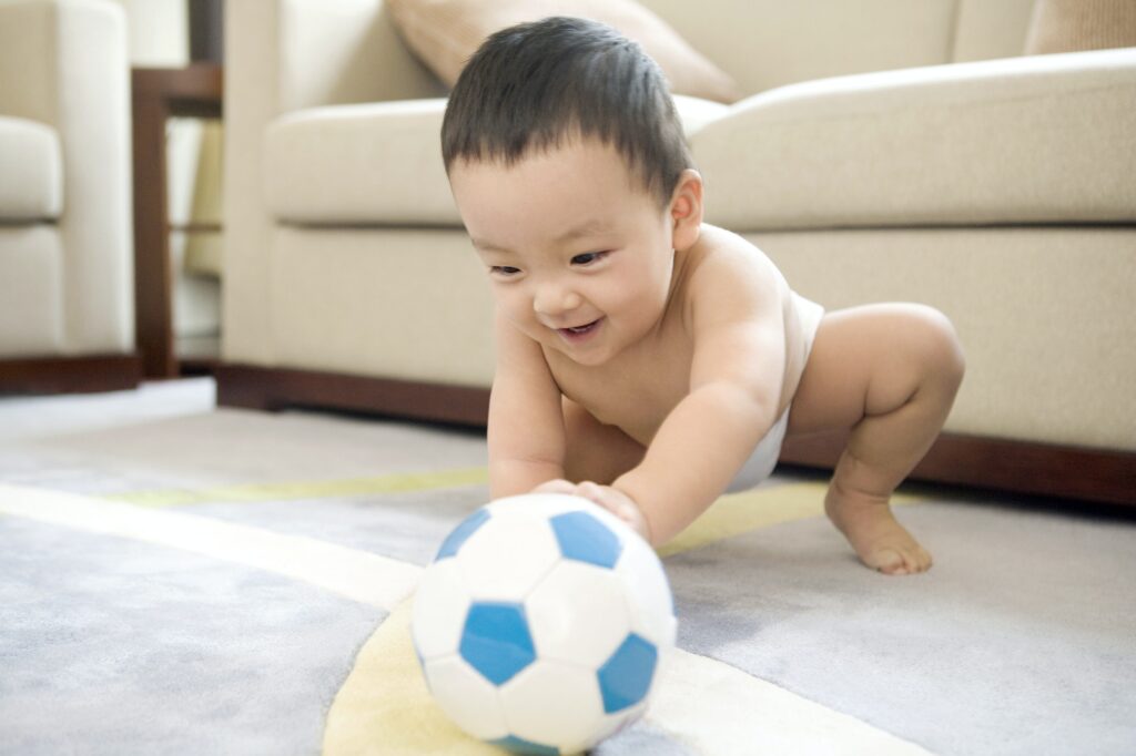 Infant with soccer ball