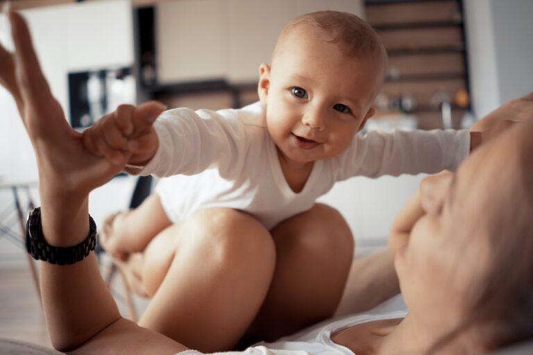 Young mother with baby Early